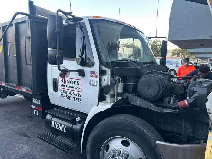 Commercial diesel truck serviced outdoors